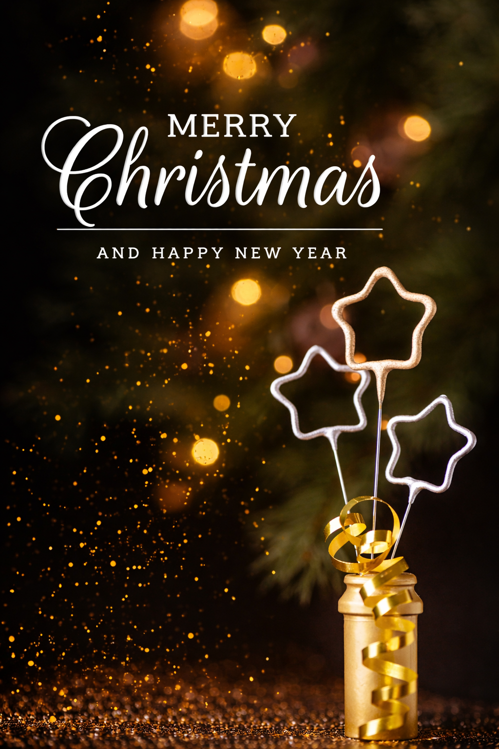 A festive greeting card with "Merry Christmas and Happy New Year" text, gold ribbon, and three star-shaped sparklers against a blurred holiday lights background.